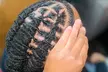 Revitalize with Retwist, Loc detox, Starter locs, and Free style at Melodic Roots & Wellness (Up to 48% Off) - Second Medium