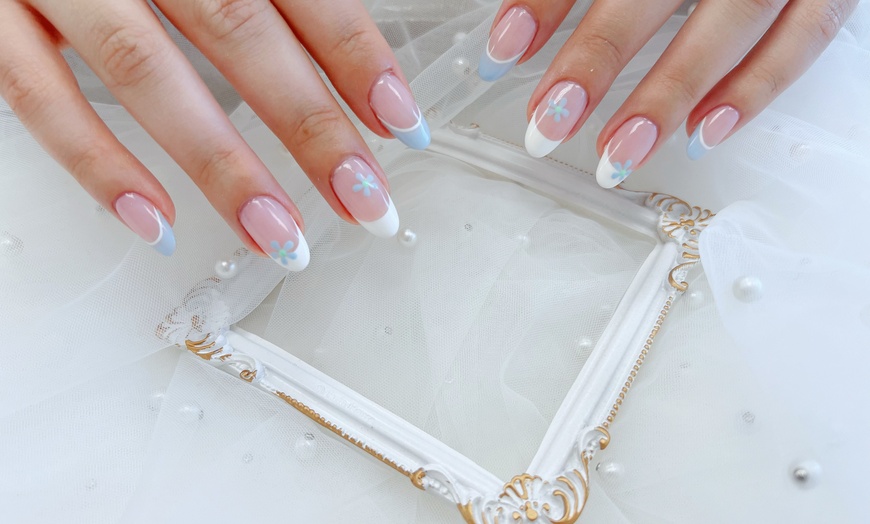 Image 1: Up to 26% Off on Nail Salon - Mani-Pedi at Moonlit Nails & Spa