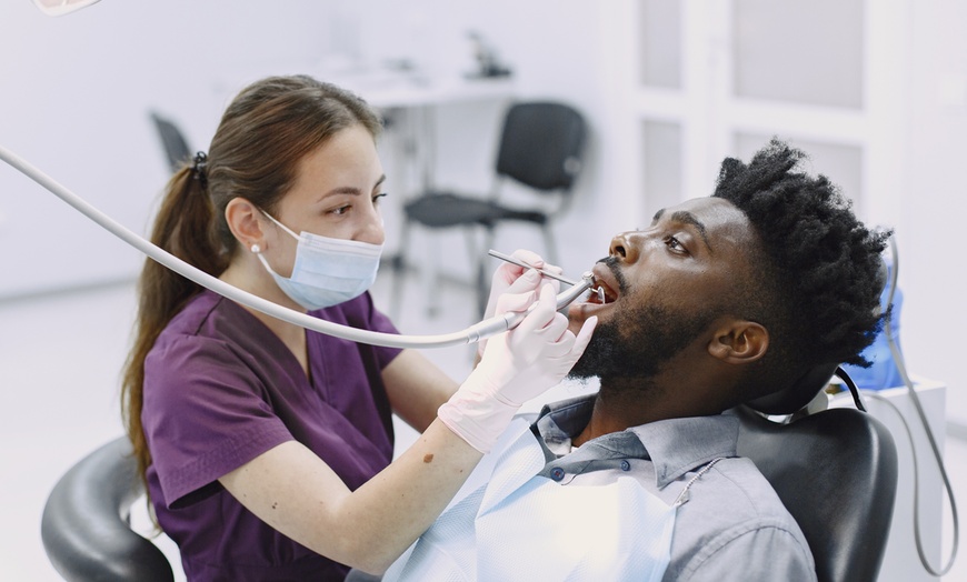 Image 2: Up to 34% Off on Dental Exam, Scale & Polish at Crown Dental