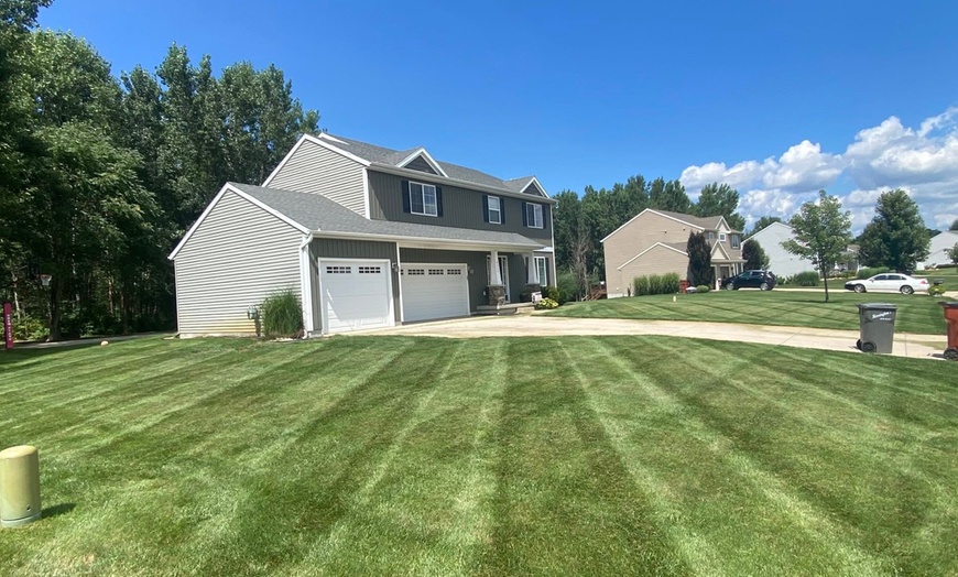 Image 1: Transform Your Yard with Lawn Mowing, Weed-Eating, Edging & Blowing