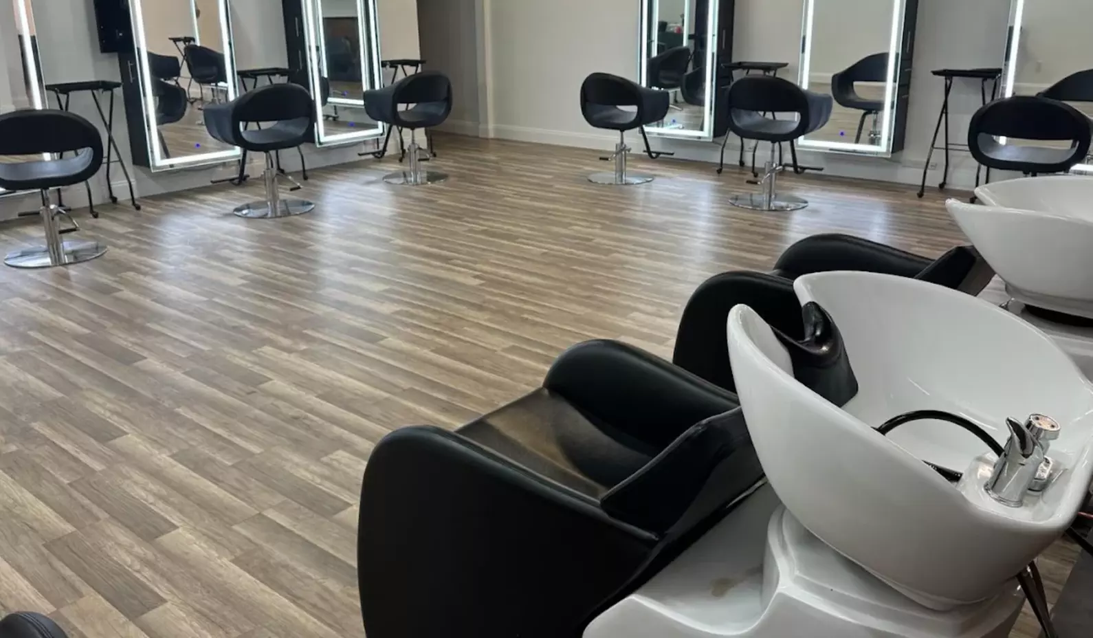 Revitalize Your Hair: Expert Haircuts, Deep Conditioning, Root Touch-Ups, and Partial Highlights (Up to 54% Off)