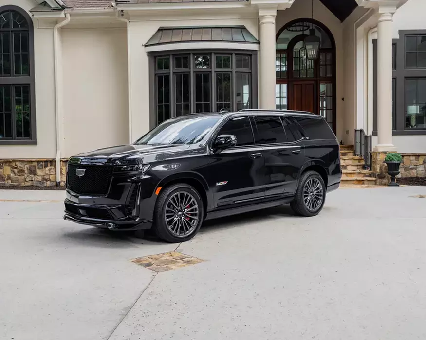 Experience Chauffeured Luxury with Our Black SUV Packages