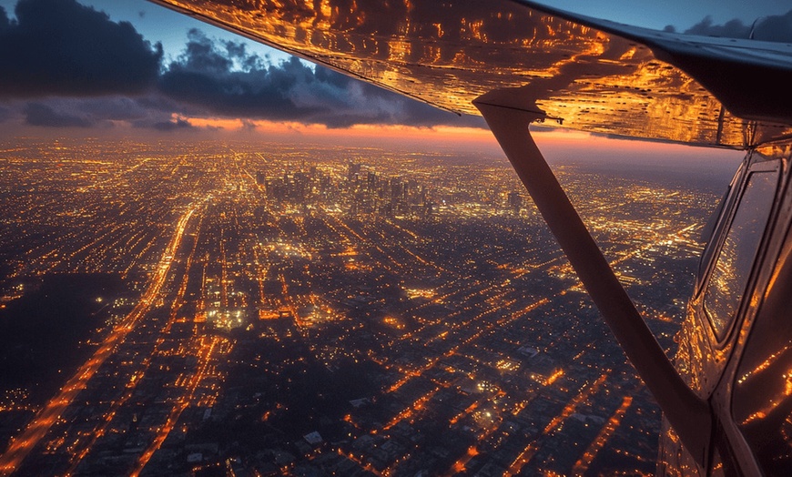 Image 1: LA Scenic Flight Tour – Night (40 Min) or Day Beach (60 Min)