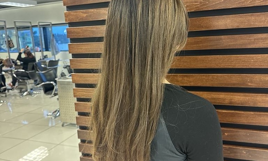 Image 1: Up to 55% Off on Salon - Women's Haircut at Studio 153