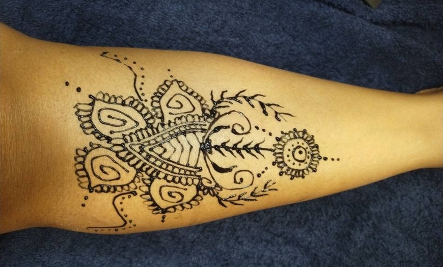Image 11: Henna Hand for Cultural Elegance!