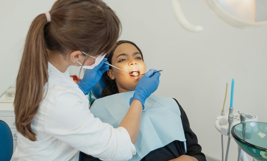 Image 7: Up to 52% Off One-Hour In-Office Laser Teeth Whitening Treatment &Consultation at Crown Dental