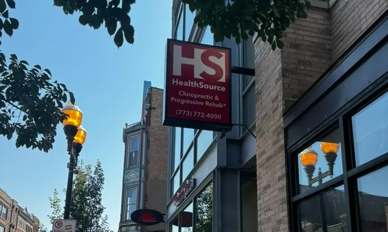 Initial Chiropractic Exam, Consultation, & X-Rays OR 2 Laser Therapy