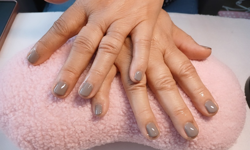 Image 5: One or Three OPI Manicure and Pedicure Packages