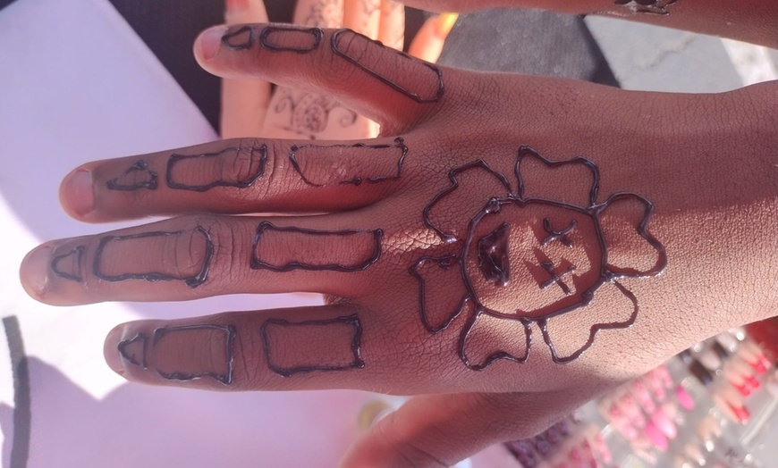 Image 15: Henna Hand for Cultural Elegance!