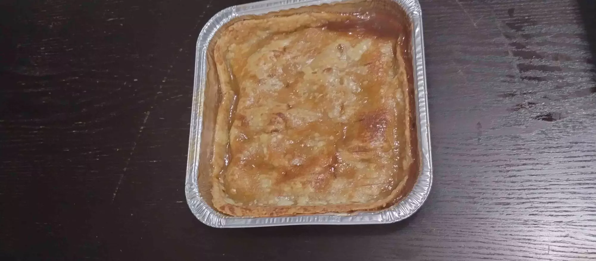 Enjoy a Delicious Peach Cobbler that Serves 40-50 People