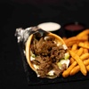 Image 1: Discover The Sizzling Gyro's Mediterranean Delights with Lamb & Beef Gyro Options, enjoy up to 27% off