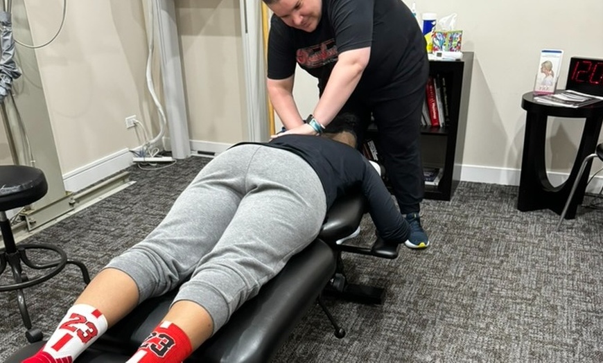 Image 11: Chiropractic Exam with Spinal Decompression or Laser Therapy Treatment
