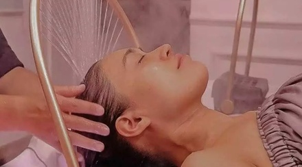 50-Minutes Oriental Body Massage with Hot Stone Treatment - Mings Massage Spa