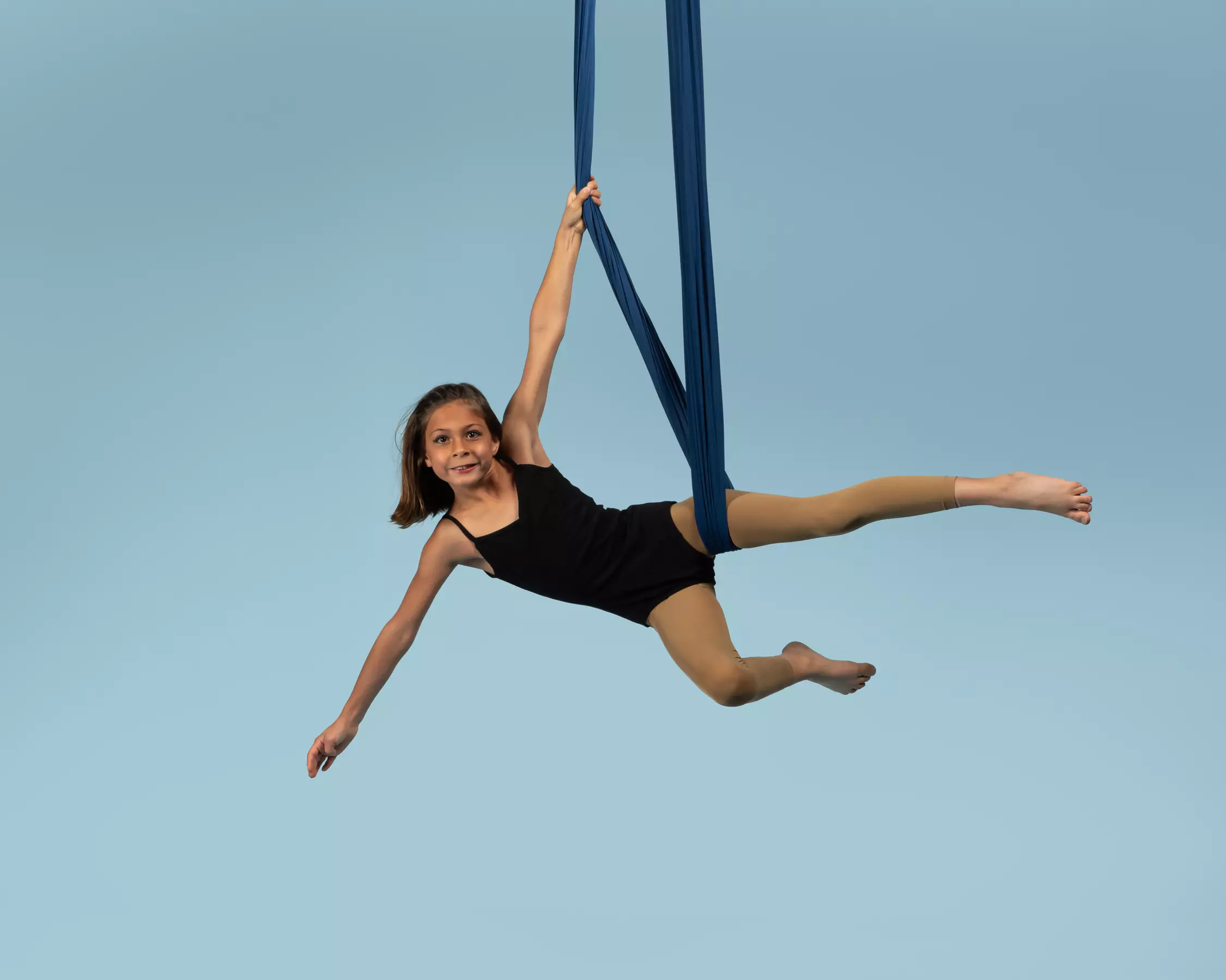 Explore aerial fitness at The Apollo Center with classes for youth and teen/adults, up to 58% off. Discover a unique workout!