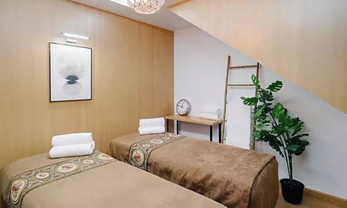 Jusqu'à 50% de remise sur Massage - Californien chez Dame Paris - Primary Image