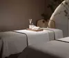 30-Min Full Body Massage with Aromatherapy, Hot Stones, Hot Towel, & Signature OR Luxury Facial (Up to 52% Off)