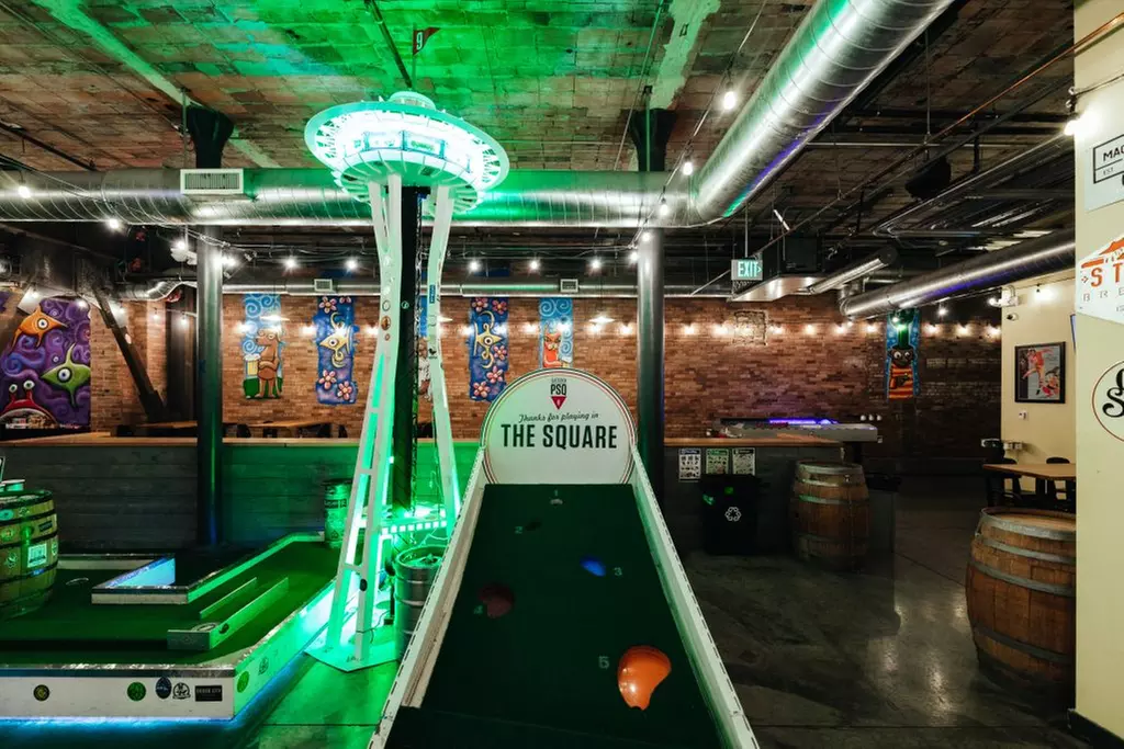 Enjoy Mini Golf, Duffleboard, and a Drink with Your Squad