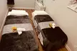 60-Min Facial Lymphatic Massage, Neck+ Shoulder Relaxation or Body Scrub with Hot Stone & More (Up to 50% Off) - Second Medium