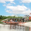Image 1: Experience Wide Angle Tours' Everglades adventure for one or two, with up to 20% off. A thrilling airboat tour awaits!