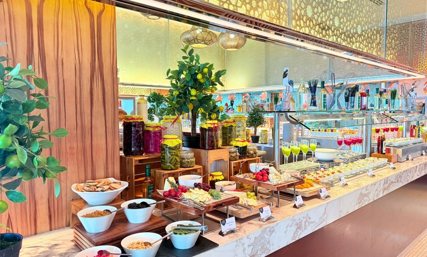 Image 5: Lunch / Dinner Buffet with Soft Beverages Up to Four Adults or A Child
