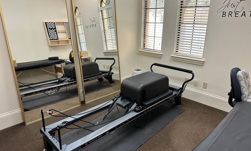 Image 1: Enhance Wellness with One or Three Pilates Reformer Private Session