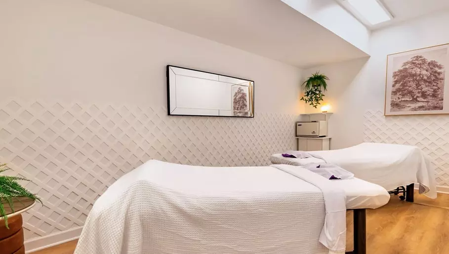 Solo or Couples Deep Tissue Massage + Hot Stones & Aromatherapy