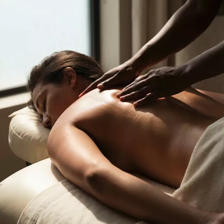 Relax with a Swedish Massage and Hot Stones + Aromatherapy