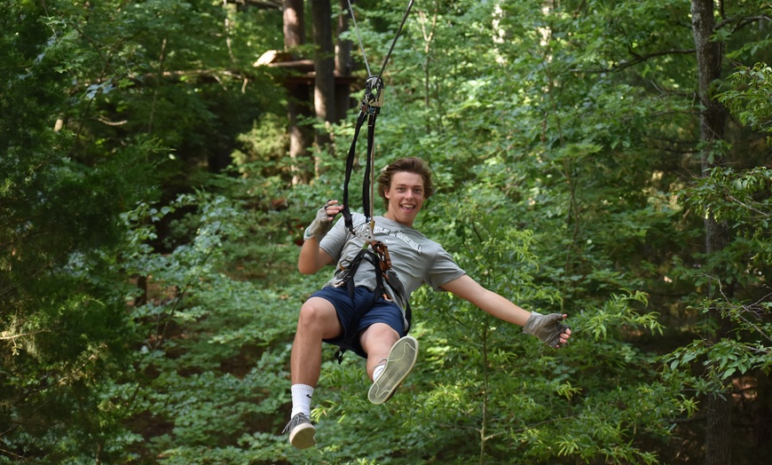 Image 1: Experience the High Ropes with Adults and Child Admissions 