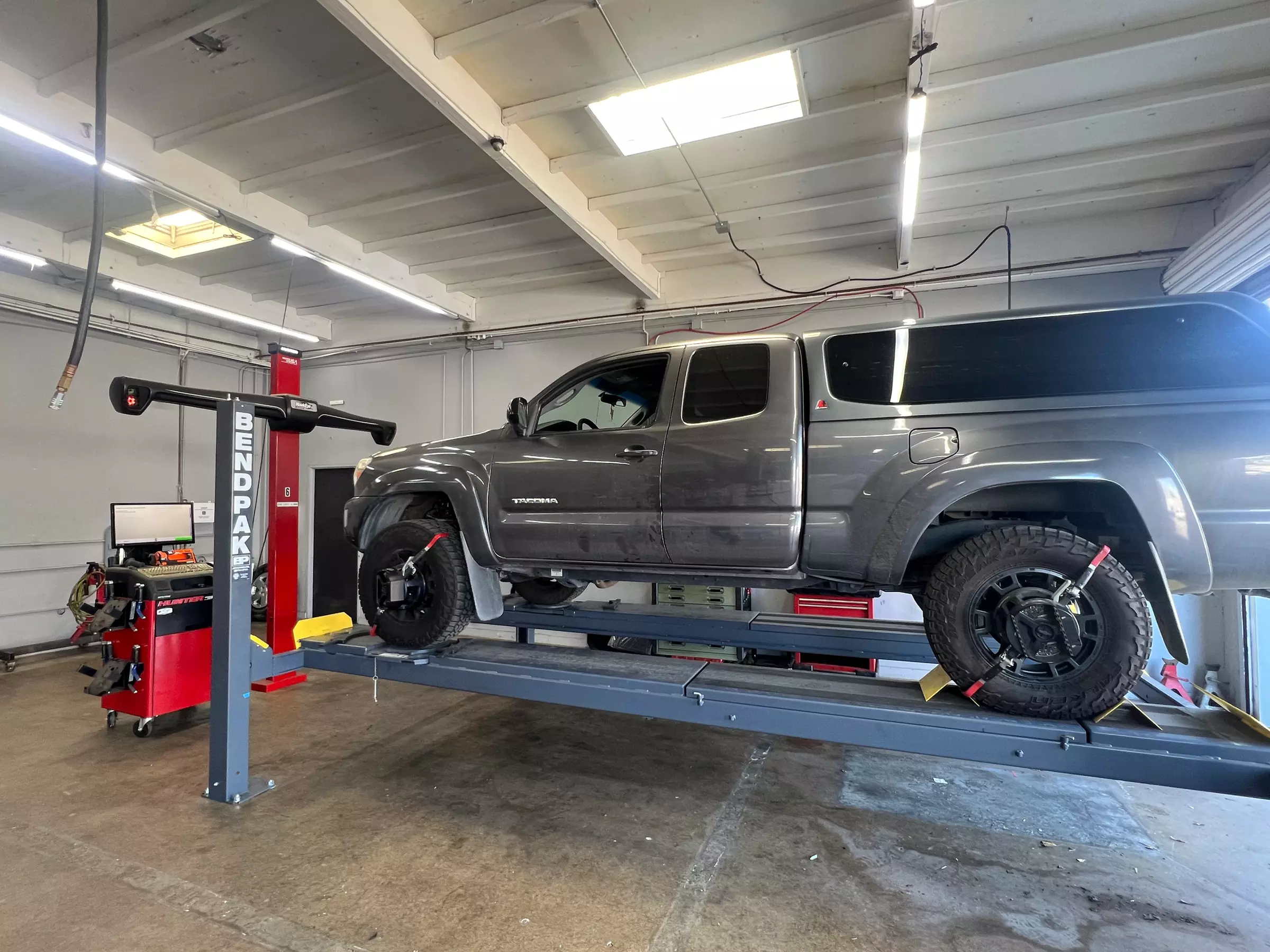Up to 55% Off on Wheel Alignment / Balancing at J&H Auto Repair