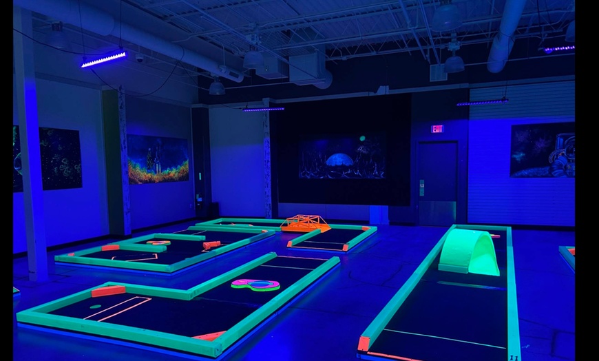 Image 8: Glow-in-the-Dark Mini Golf with Vibrant Challenges – Norman