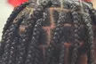 Get Medium Above the Waist Boho Braids/ Knotless, Instant Locs, or Braids (Up to 55% Off) - Second Medium