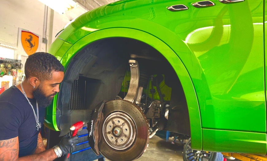Image 1: Complete Front or Rear Brake Pad Replacement (Up To 53% Off)
