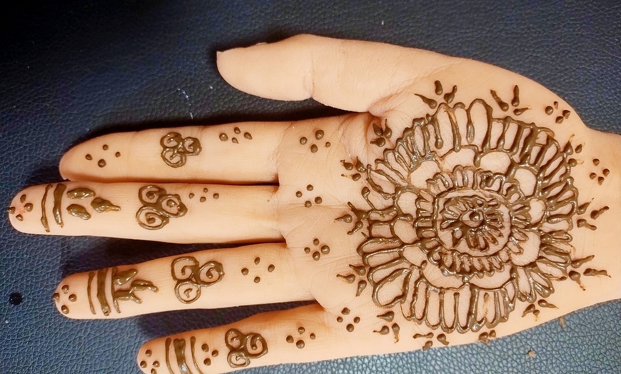 Image 12: Henna Hand for Cultural Elegance!