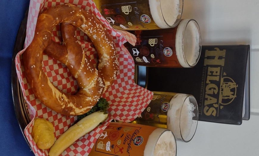 Image 1: Indulge in a German Bier Sampler with Pretzels for Two People at Helga's German Restaurant and Deli, up to 32% off