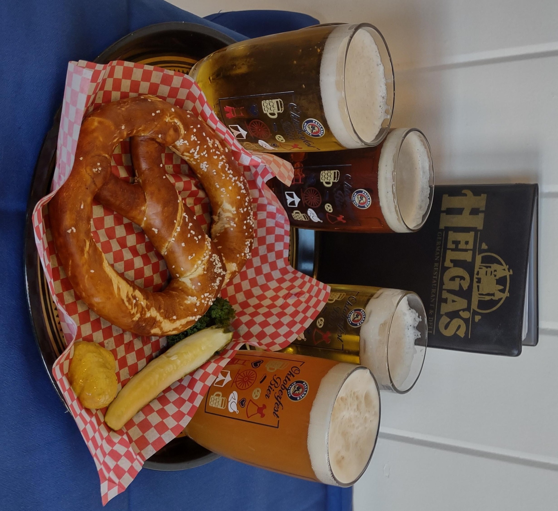 Indulge in a German Bier Sampler with Pretzels for Two People at Helga's German Restaurant and Deli, up to 32% off