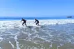 Catch waves with Easy Surf LA's 2-hour group surfing lessons for one to three people, up to 40% off - Second Medium