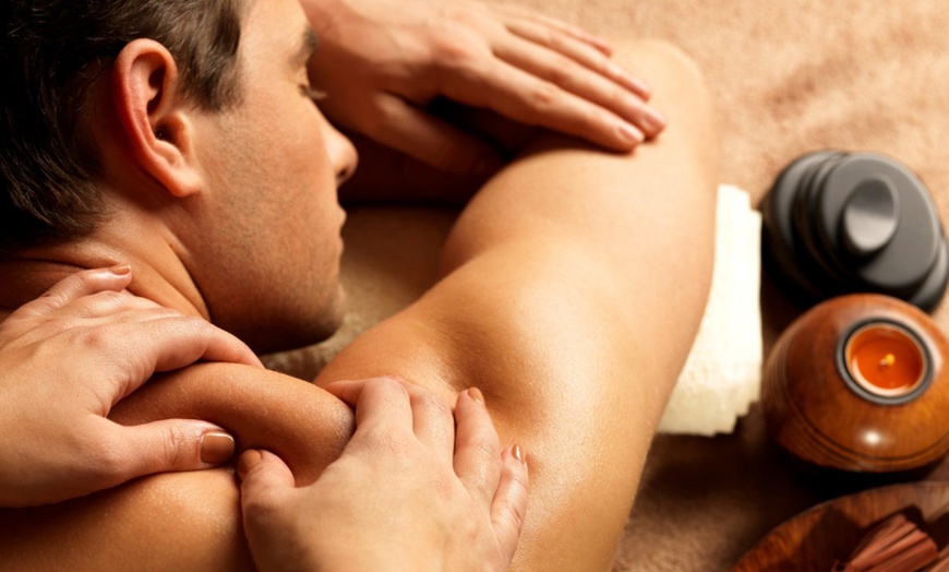 Image 4: Up to 60% Off on Therapeutic Massage at East 2 West Wellness