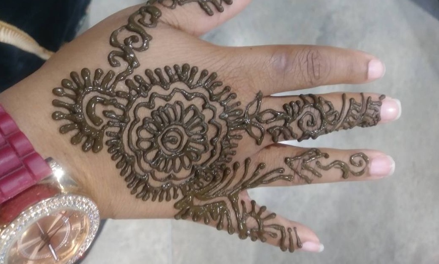Image 9: Henna Hand for Cultural Elegance!
