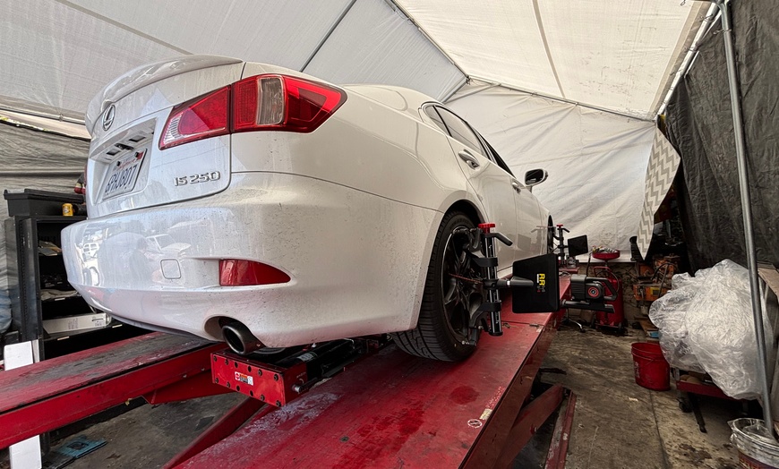Image 2: Achieve Optimal Handling w/ 4-Wheel Alignment, Including Tesla Models