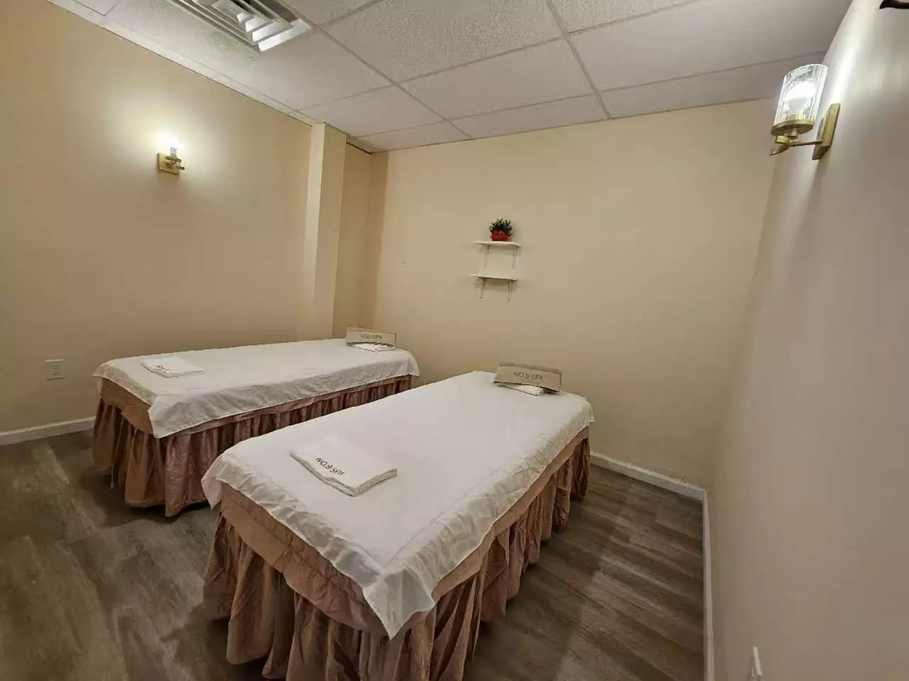 Blissful Escape Awaits: Deluxe Bodywork or Foot Reflexology Package