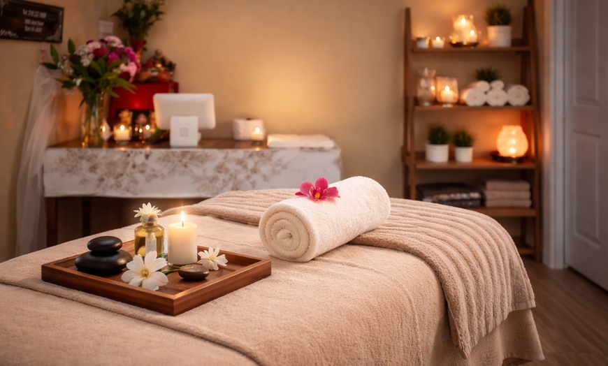 Image 2: 70-Minute Combo Massage with Oil & Hot Stones - Up to 26% Off