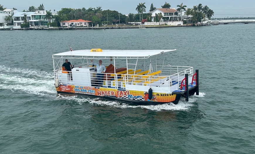Image 3: Locals Ride the Water Taxi Miami Between Miami Beach Marina and Downtown (Bayside Marketplace) (Up to 75% Off)