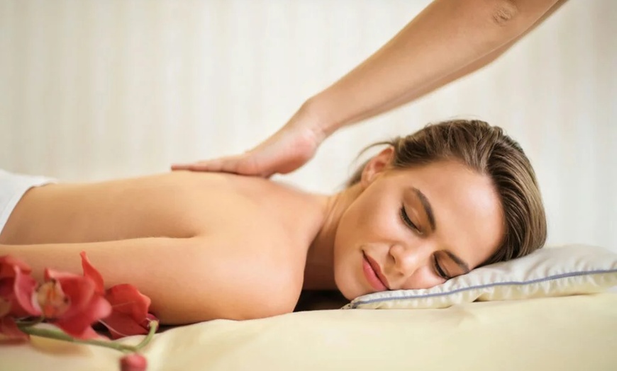 Image 1: Relax with 60 or 90-Min Swedish, Hot Stone, Relaxation Massage, & More