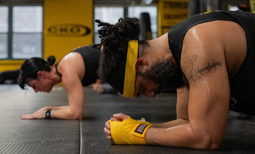 Image 1: Three Classes or Unlimited Access to Kickboxing Classes 