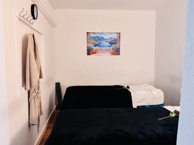 1x Choice-of-Massage: Deep Tissue or Swedish + Hot Stones & Essential Oils (60 Min) - Healing Spa