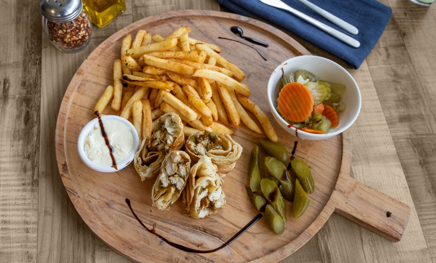 Image 9: Mediterranean  Delicious Pizza  or Shawarma / Man'oushe Breakfast