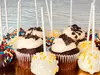 Indulge in delicious treats from The Velvet Cake Bakery with options for 2 dozen cupcakes or 2 pounds of cookies, up to 34% off