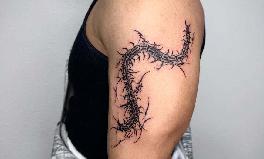 Image 8: Custom Fine Line & Minimalist Tattoos with Expert Line Work