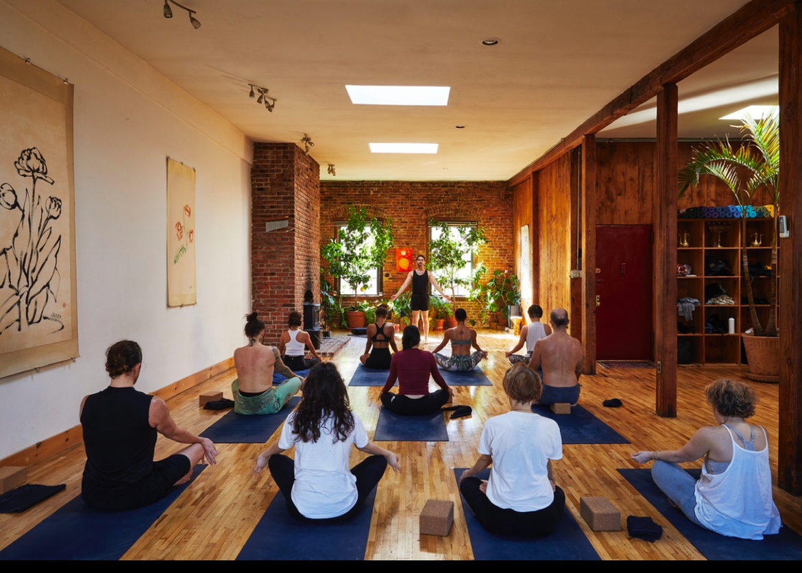 Drop in for a Yoga Class with a Cozy Fireplace Setting at New Vibe Yoga (Up to 60% Off)