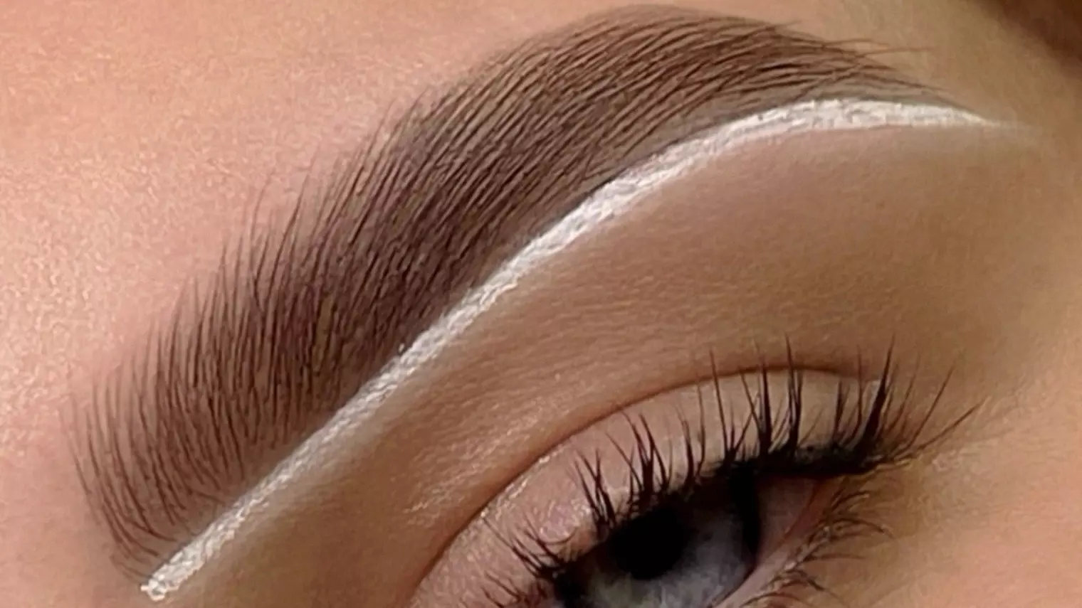 One Brow with Shaping, Tinting, and Optional Brow Lamination Session